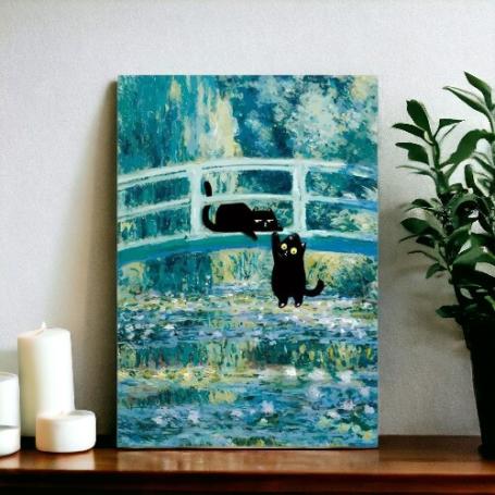 Bekend schilderij van Monet, de waterlelies met op de brug 2 zwarte katten